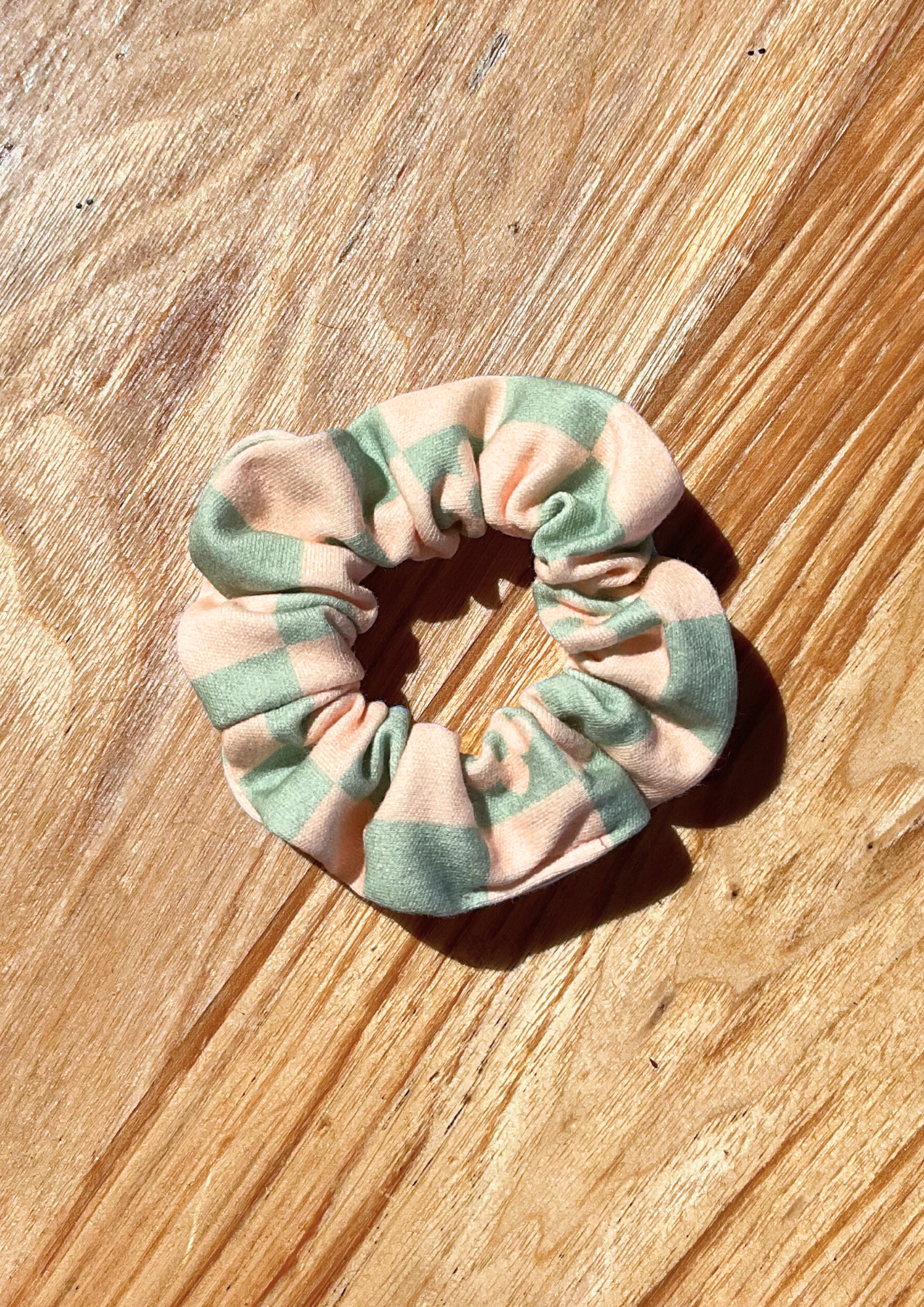 Pastel Checks Scrunchie. Sage green and pastel pink checkered print. Eravela handmade organic cotton scrunchie with soft organic cotton elastic.