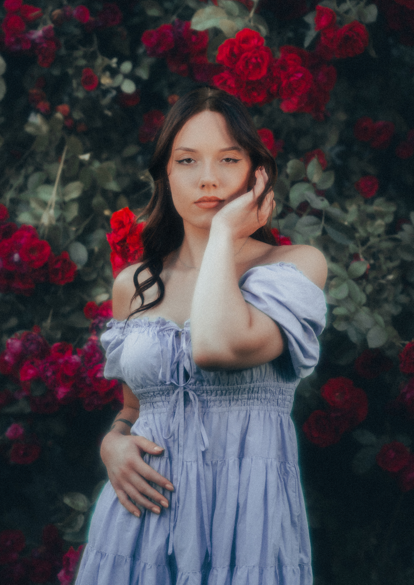 MODEL WEARS ERAVELA PENELOPE MIDI DRESS LILAC IN ENCHANTED ROSE GARDEN