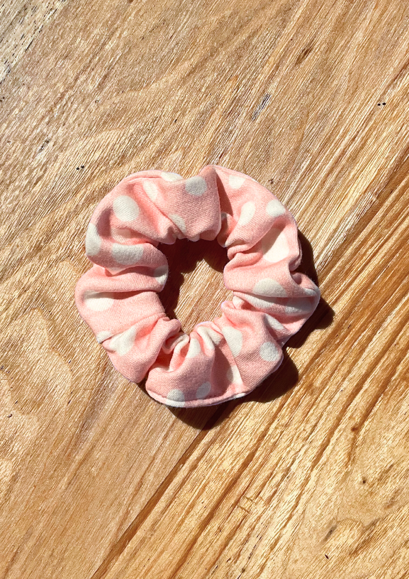 Strawberry Milk Scrunchie. Pink with white polka dots. Eravela handmade organic cotton scrunchie with soft organic cotton elastic.